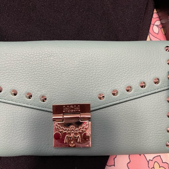 Small MCM wallet purse Teal colored . Comes with box and bag